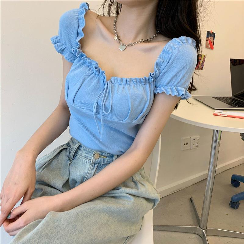 Sculpted Wood Ear Ribbon Drawstring Knit Top