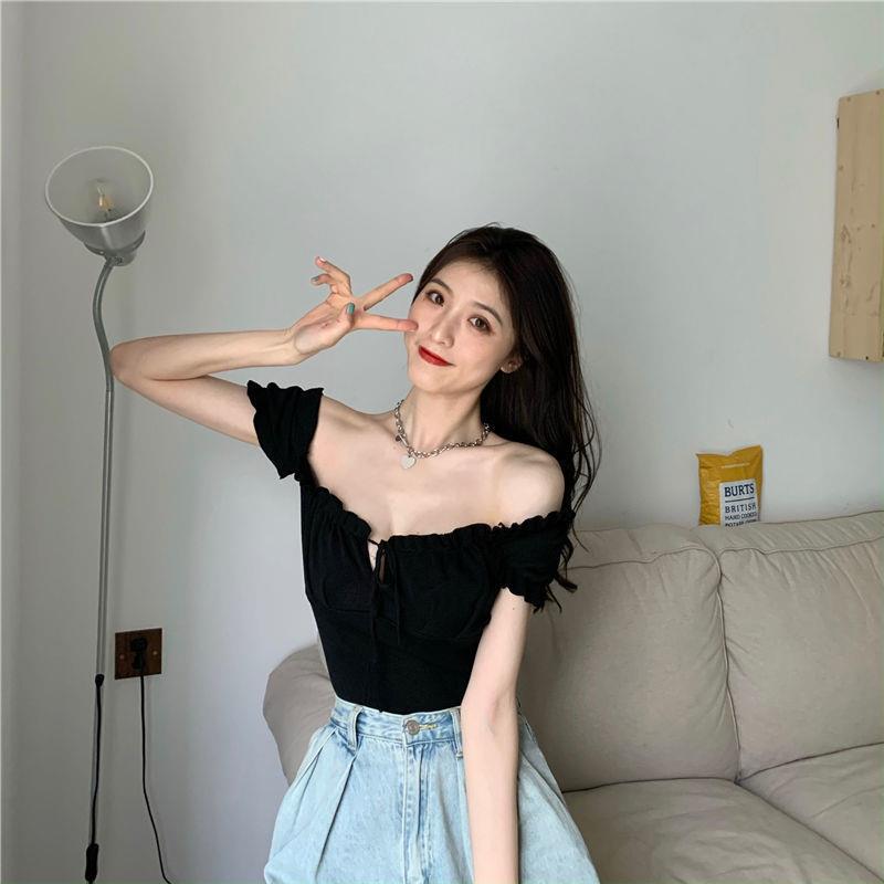 Sculpted Wood Ear Ribbon Drawstring Knit Top