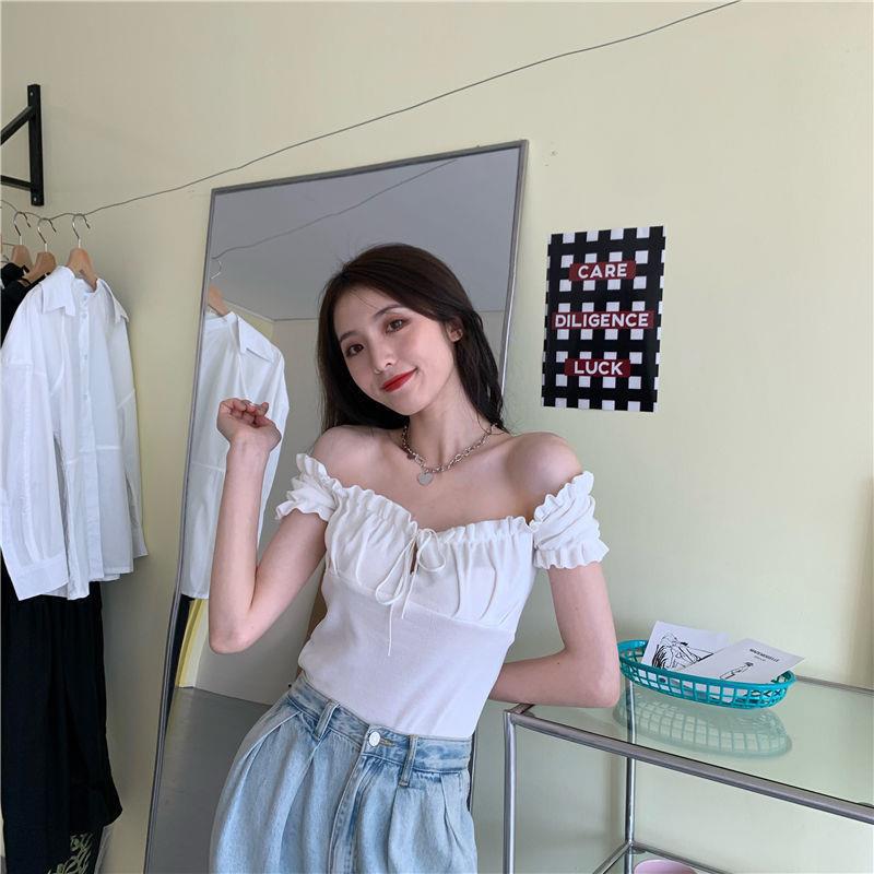 Sculpted Wood Ear Ribbon Drawstring Knit Top