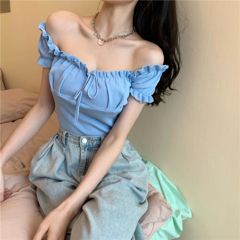 Sculpted Wood Ear Ribbon Drawstring Knit Top