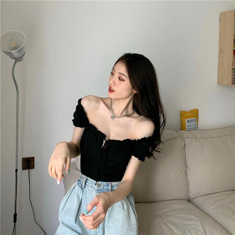 Sculpted Wood Ear Ribbon Drawstring Knit Top