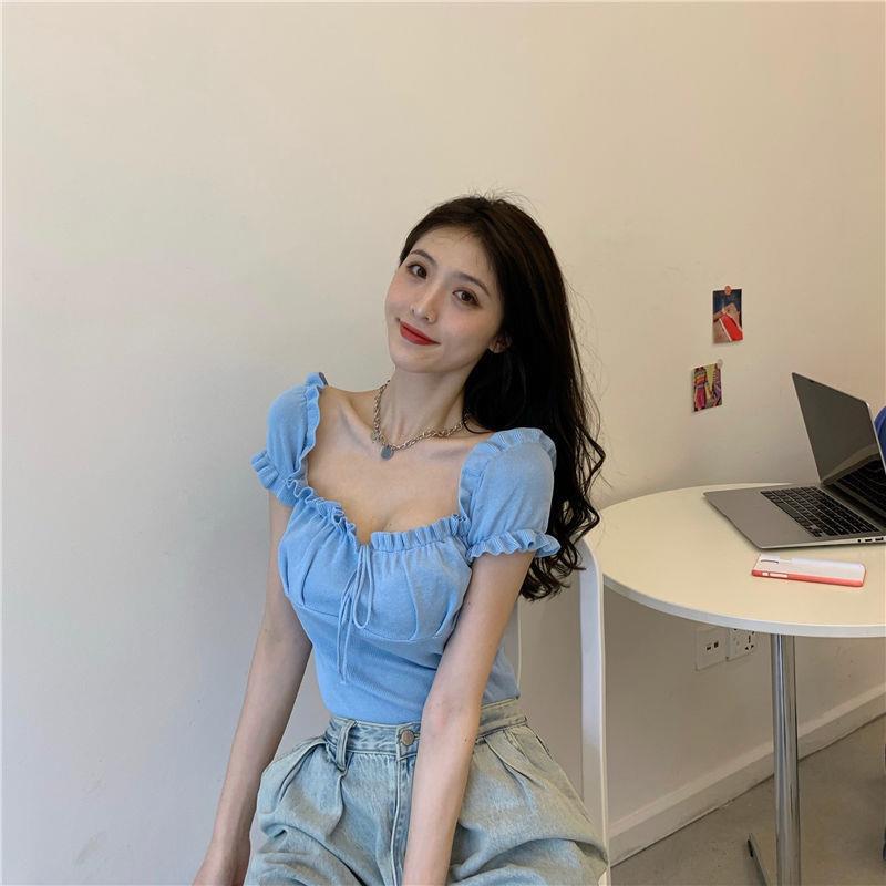 Sculpted Wood Ear Ribbon Drawstring Knit Top