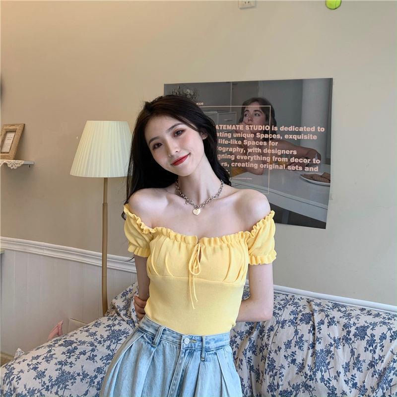 Sculpted Wood Ear Ribbon Drawstring Knit Top