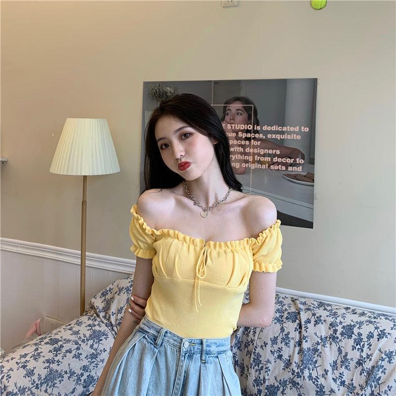 Sculpted Wood Ear Ribbon Drawstring Knit Top