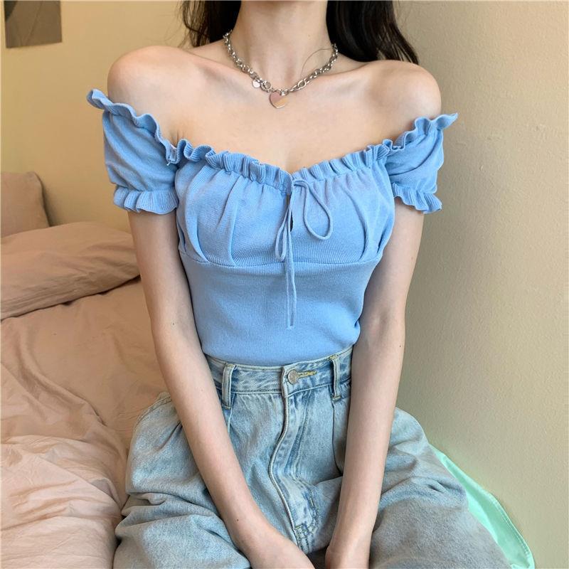 Sculpted Wood Ear Ribbon Drawstring Knit Top