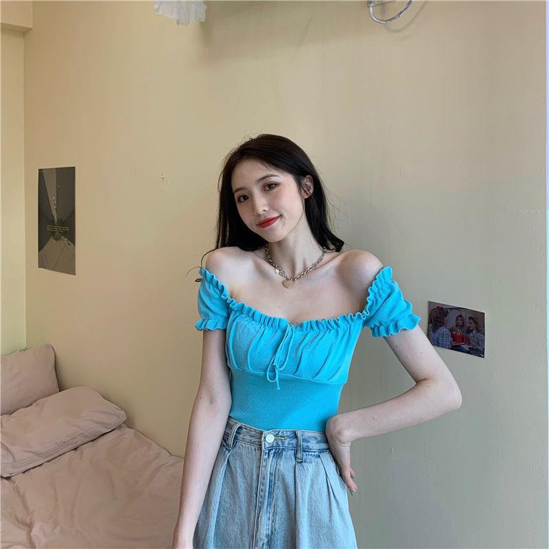 Sculpted Wood Ear Ribbon Drawstring Knit Top