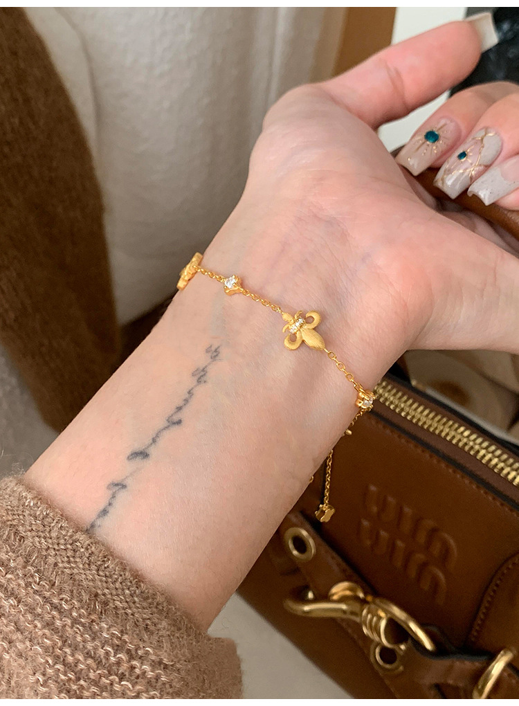 Women's Plated Gold Fleur-de-lis Crystal Bracelet